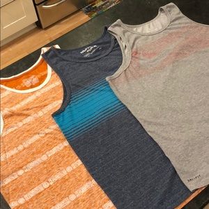 3 men’s cut offs/tanks